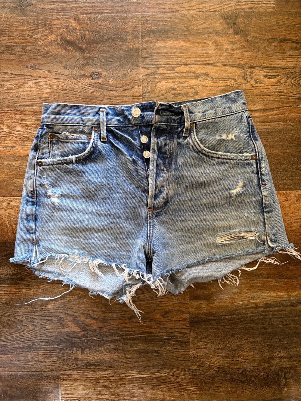 Agolde Distressed Light Blue Denim Cutoff Shorts